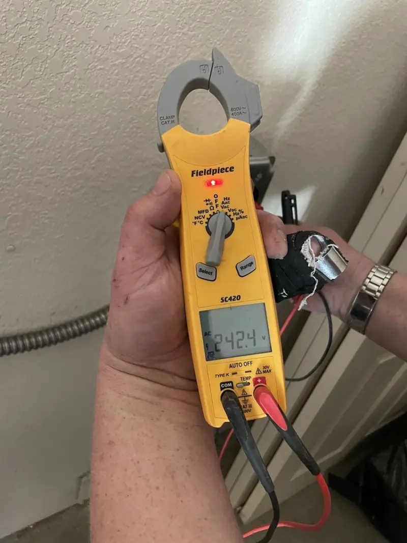 Voltage testing with clamp meter during Hot Tub / Pool Electrical Wiring in Raymond
